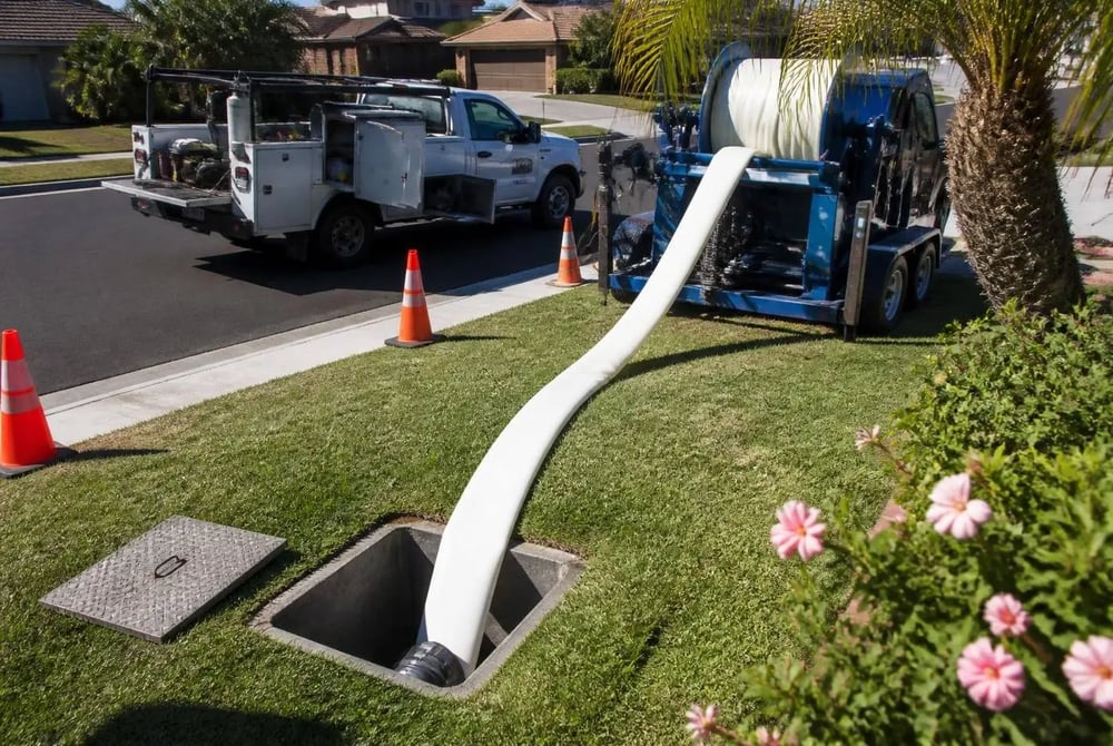 Trenchless sewer repair in progress with pipe lining equipment in La Crescenta